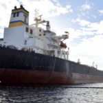 Tanker at the shallow TMX Transmountain Pipeline terminus in Burnaby, BC.