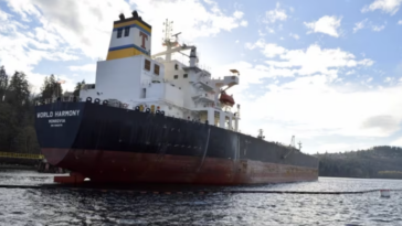 Tanker at the shallow TMX Transmountain Pipeline terminus in Burnaby, BC.