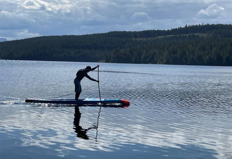 Dallas Allison paddleboarding for the Prince Rupert Hike for Hospice.